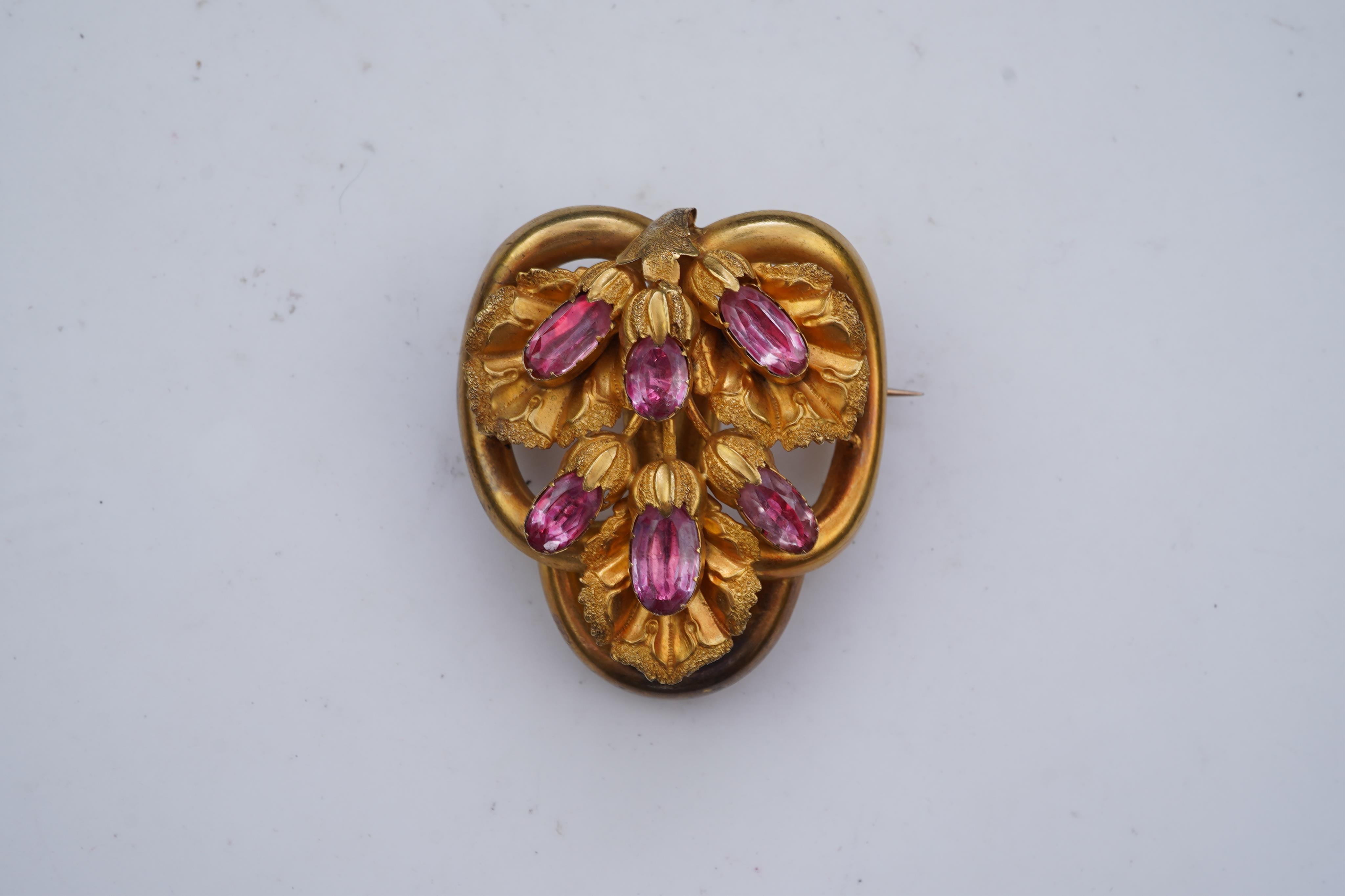 A gold and pink topaz brooch, mid 19th century